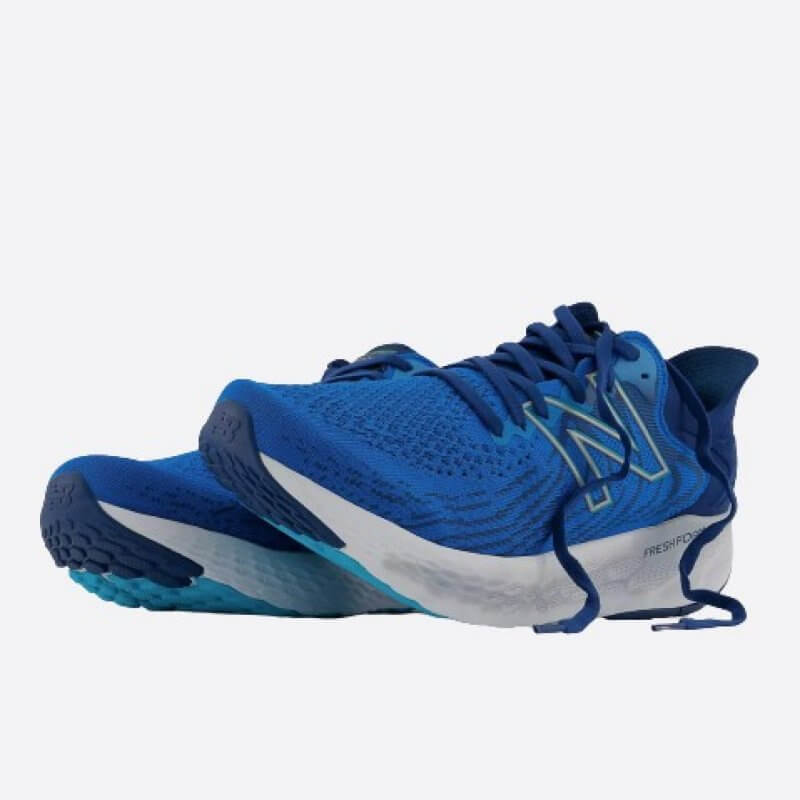 Pánské modré tenisky New Balance M1080S11 vedle sebe